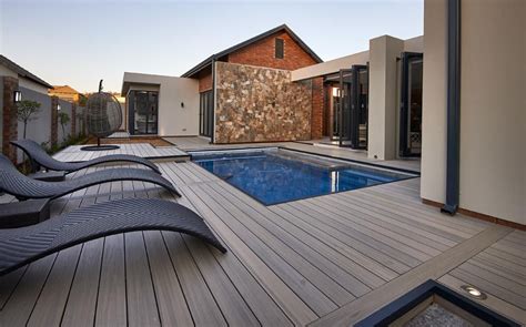 Interested in getting a fiberglass swimming pool? pool composite decking | Decks backyard, Building a deck