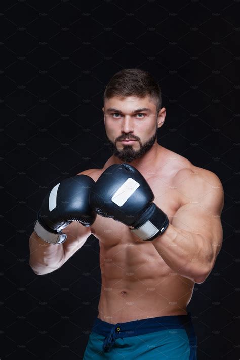Strong Muscular Boxer In Black High Quality Sports Stock Photos