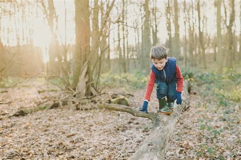 Boy Playing In Woods By Stocksy Contributor Rebecca Spencer Stocksy
