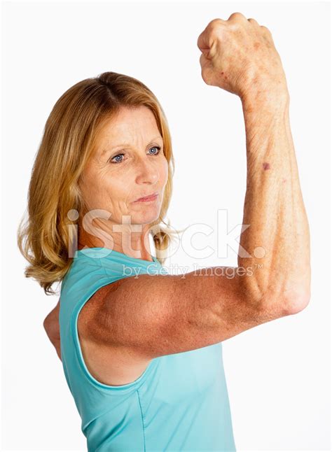 Woman Flexing Muscle Stock Photo Royalty Free Freeimages