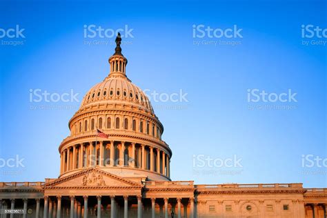 The United States Capitol Building At Sunrise Stock Photo Download
