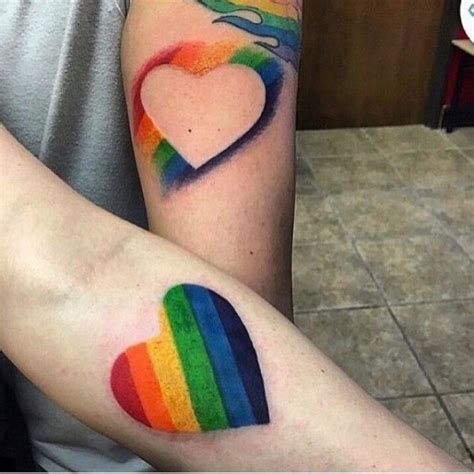 Show Your Pride With One Of These Amazing Rainbow Hued Tattoos