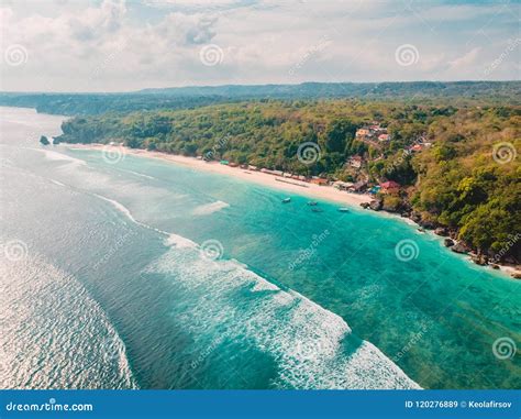 Beautiful Coast With Turquoise Ocean And Waves In Bali Aerial View