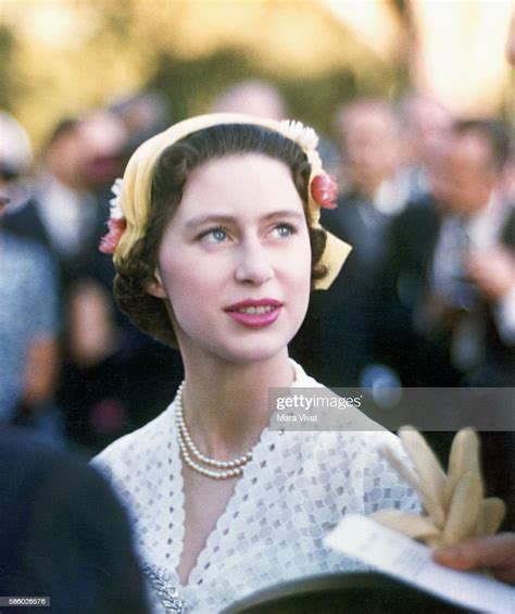 A young Princess Margaret of the United Kingdom wears a spring bonnet ...