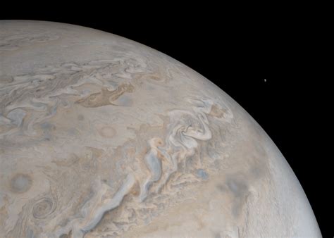Io Rising Jupiters Volcanic Moon Rises Just Off Nasa Junocam