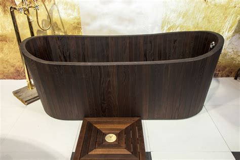 If you are to buy a wooden tub tray, why not go for royal. Wooden Bathtubs a Delight for the Senses and Your Home Decor
