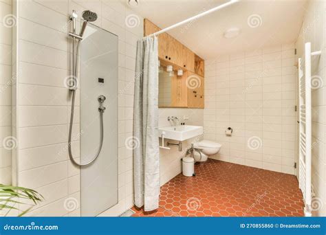 A Bathroom With A Shower Sink And A Toilet Stock Photo Image Of Tiles