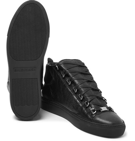 Balenciaga's iconic ceinture ankle boots are reworked in navy brushed leather for the new season. Balenciaga Arena Creased-leather Sneakers in Black for Men ...