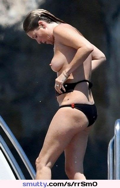 Kate Moss Losing Her Bikini Top While Climbing On Board A Yacht