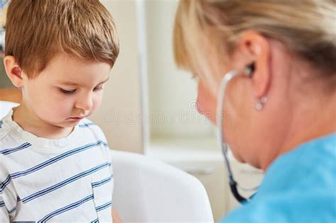 Pediatrician Palpates Tonsils In Child Stock Photo Image Of