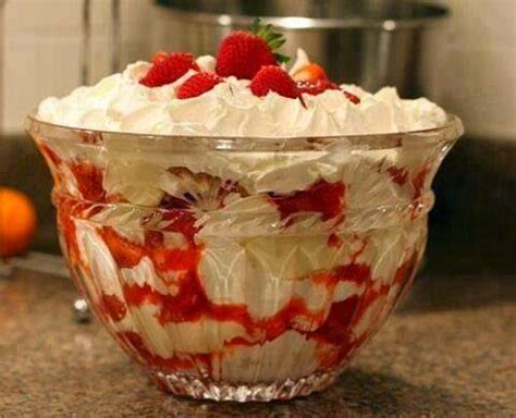 On low speed, combine half the cool whip and all the liquid in mixer bowl. Southern Strawberry Punch Bowl Cake | Best foods and ...