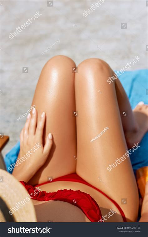 Sexy Suntan Bikini Woman Legs Relaxing Stock Photo 1079238188