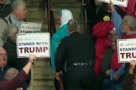 Silently Protesting Muslim Woman Kicked Out Of Trump Rally — Video Uncategorized