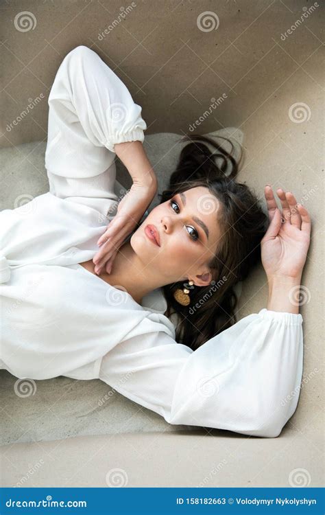 Sensual Brunette Model In A Bath Of Sand Stock Image Image Of Glamour