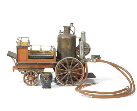 A Rare And Early Gebruder Bing Steam Driven Tinplate Toy Fire Engine