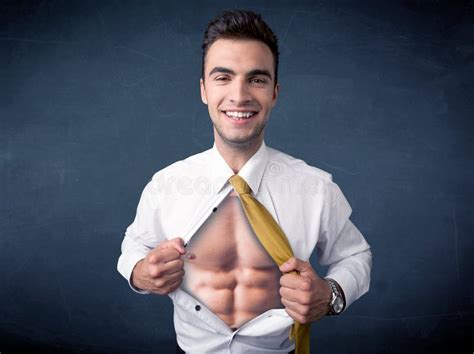 A Smiling Man Ripping Off His Shirt Covered With Stickers Stock Photo