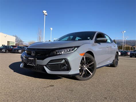 Civic hatchback receives more aggressive front and rear styling. Penticton Honda | 2020 Civic Hatchback Sport Touring 6MT ...