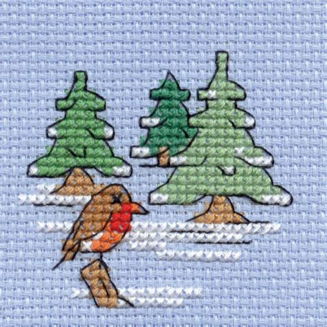 Patterns for cross stitching and making your very own christmas ornaments. Hobbycraft Mini Christmas Cross Stitch Kit Robin And Tree ...