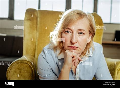 Adult Short Haired Woman With Blue Eyes Being Unhappy And Depressed