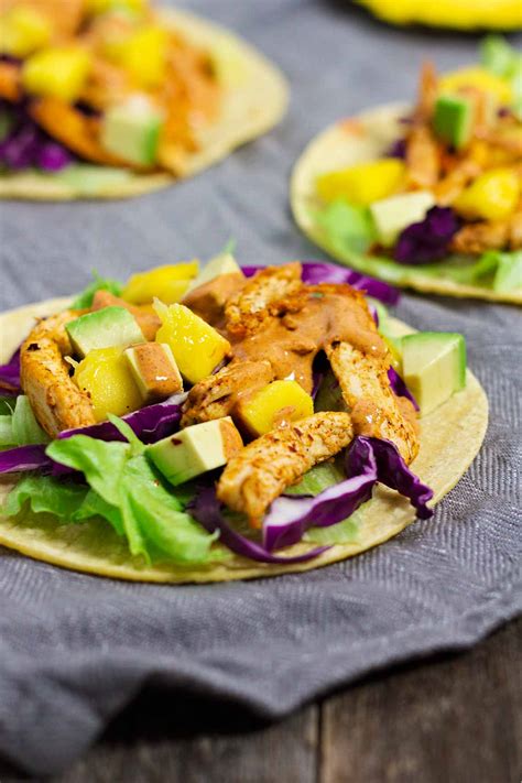 Combine mango, avocado, cilantro, onion, salt and juice from remaining lime in a bowl and store in refrigerator while chicken bakes. Jerk Chicken Tacos w/ Mango Avocado Salsa - Jar Of Lemons