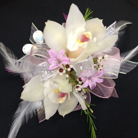 Mini Cymbidium Orchids And Feather Wrist Corsage Wrist Corsage Prom