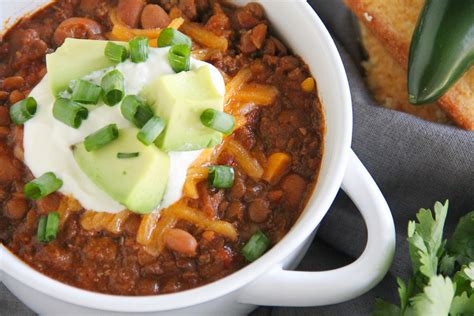 This smoky lentil chili recipe is a vegetarian and vegan version of the classic chili con carne. Slow Cooker Spicy Lentil Chili | Say Grace