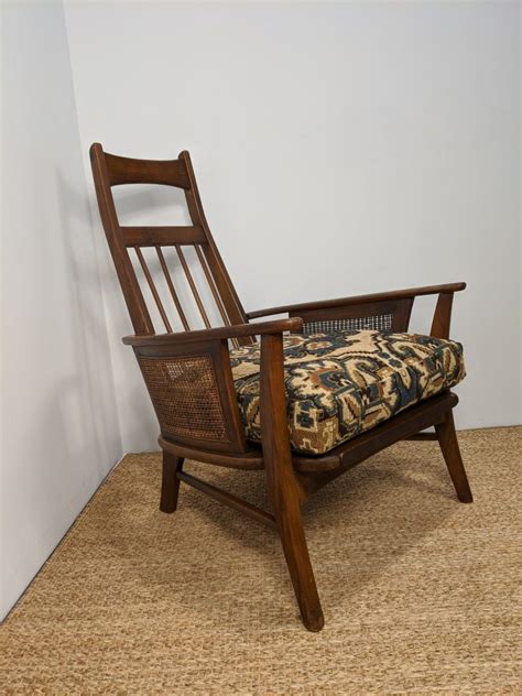 Vintage bohemian boho rattan peacock chair with black details. Mid Century Walnut & Rattan High-back Lounge Chair - EPOCH
