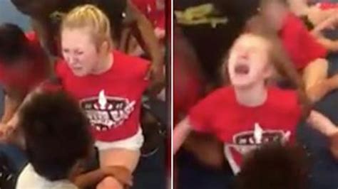 police investigating video of cheerleader who was forced to do splits z100