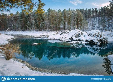 Winter Panorama Small Turquoise Lake In The Mountains Among Snow