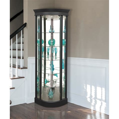 This lighted corner curio is sure to become a cherished piece of furniture in your home. Charlton Home® Galghard Lighted Corner Curio Cabinet ...