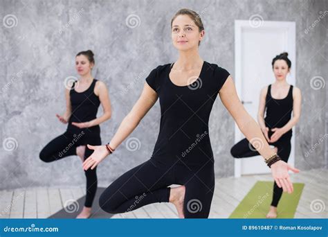 Smiling Yogi Girl In Class In Yoga Asana Exercising Stretching Stock