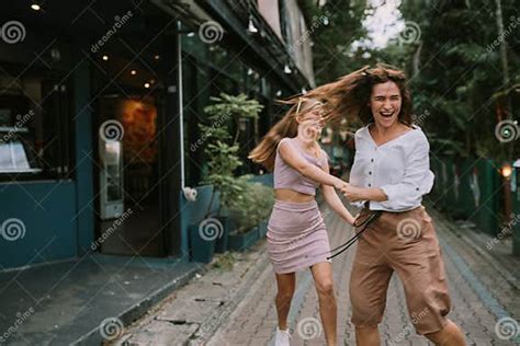 Two Lesbians Having Fun On The Street Stock Image Image Of Togetherness Cafe 221412057