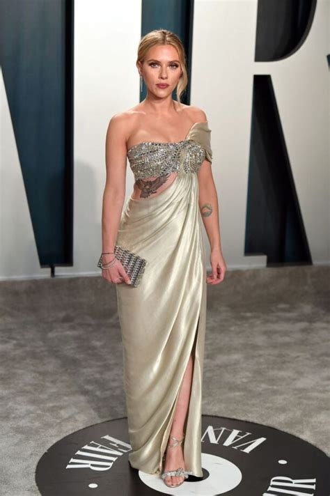 Scarlett Johansson Looks Tempting In Golden Dresses
