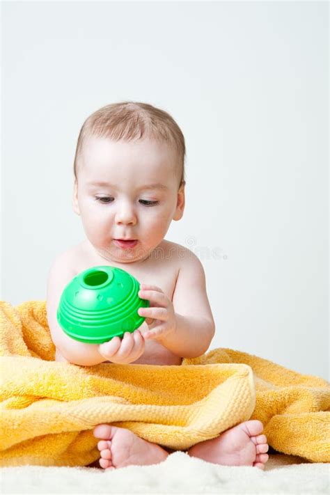 Baby After Bath Wrapped In Yellow Towel Sitting Stock Photo Image Of