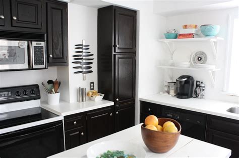 Check out these amazing before and after pictures for how to refinish cabinets darker. Planning a Kitchen Makeover: DIY, or Hire a Pro? | DIY Network Blog: Made + Remade | DIY