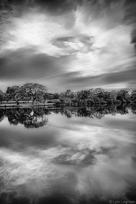 2yr · crucialmovie · r/saxophone. Black and White Photography lake reflecting clouds black ...