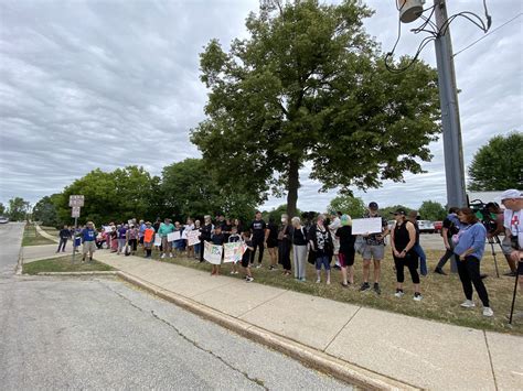 Waukesha Freeman on Twitter: "Protestors stand in silence outside the