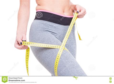 Close Up Of Woman At Gym Measuring Her Thigh Stock Photo Image Of