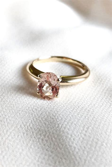 Their tone complements many skin tones and pairs well with a variety of metals. Engagement Rings : 18 Morganite Engagement Rings Were Are Obsessed With See more: www.weddingf ...
