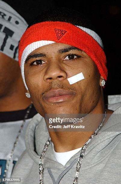 Nelly Band Aid Photos And Premium High Res Pictures Getty Images