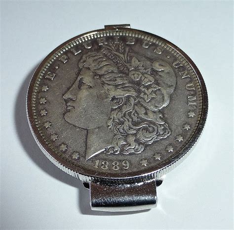 A sterling silver money clip is engraved with a checkerboard design of signature logos. Anson Sterling Money Clip w 1889 Morgan Silver Dollar SOLD ...