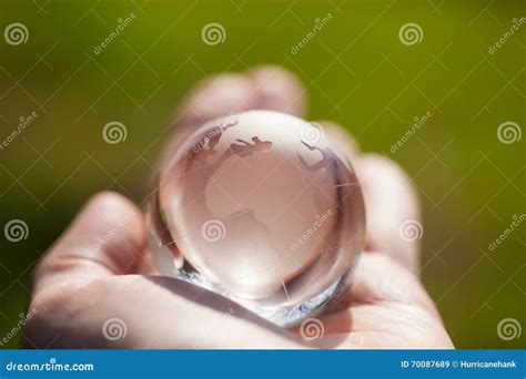 Macro Photo Of Glass Globe In Human Hand Stock Image Image Of Macro Green 70087689