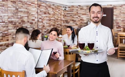 Waiter Serving Restaurant Guests Stock Photo Image Of Meet Flirt