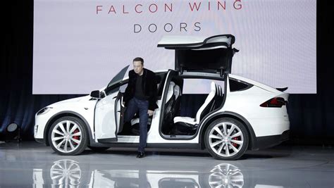 Tesla Unveils New Model X Crossover Suv