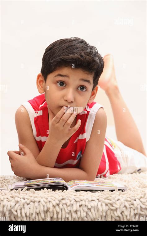 Boy Reading A Book Stock Photo Alamy