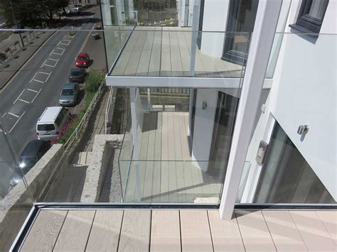 Balcony glass allows us to enjoy that extra bit of space we always need around the home. Infinity Glass Balcony - Bespoke Glass Balconies by Sunrock Balconies