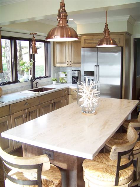 With a blend of hickory cabinets and colorful southwestern décor, this spacious kitchen remodel has a warm, earthy atmosphere. 100_2661.JPG (765×1020) | Corian kitchen countertops, Best ...