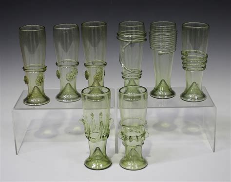 Eight Pale Green Tinted Powell Type Drinking Glasses 20th Century Each Of Tapered Cylindrical Shap
