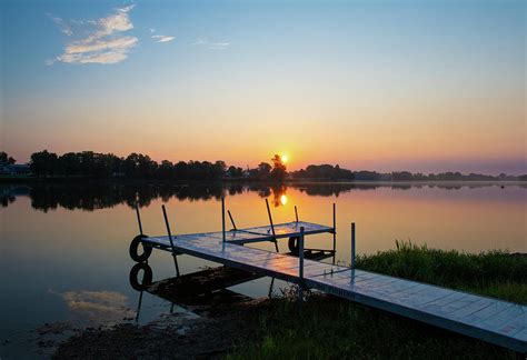 Lake Sunrise With Boat Dock Howard County Indiana Photograph By William