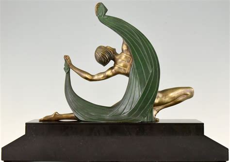 Art Deco Bronze Sculpture Of A Scarf Dancer On Sunburst Base Deconamic